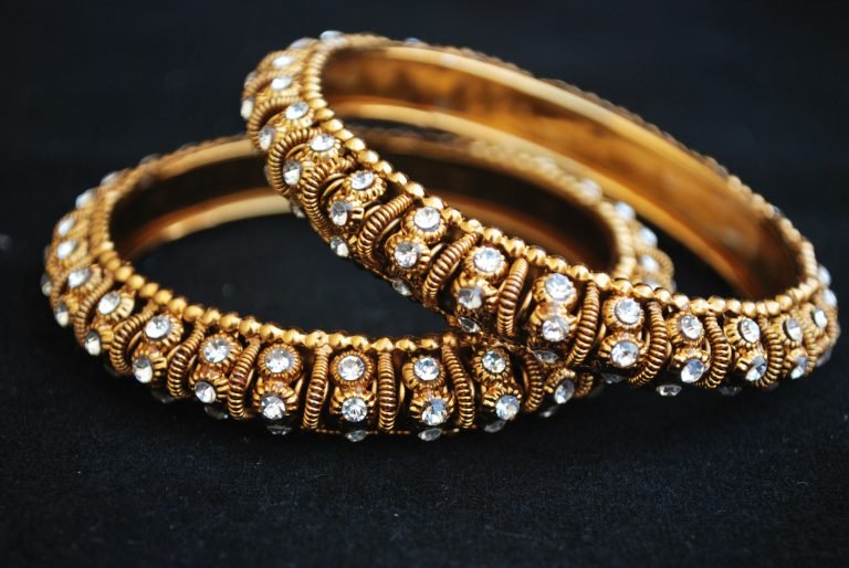 A Pair Golden colour White Stone Studded Bangles - Artificial