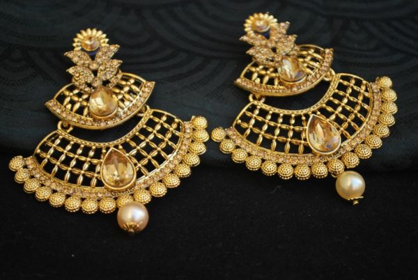 artificial jewellery gold tone long earrings with pearl