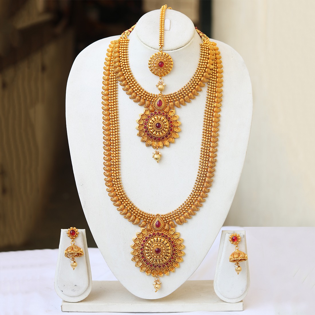 South Indian Bridal Jewellery Set In Copper In Red Stones